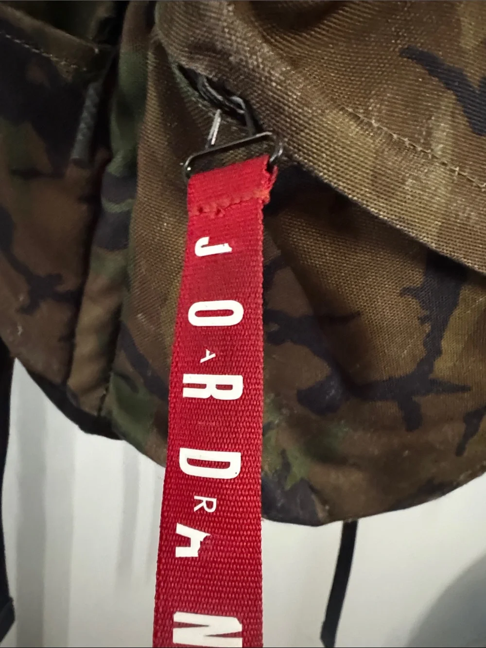 Camouflage Men's Backpack with Red Accent Pulls